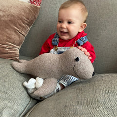 Wool Seal Soft Toy with Smiling Baby
