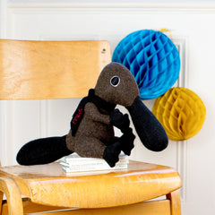 duck billed platypus wool soft toy in brown and black