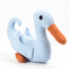 Pale blue duck on white background