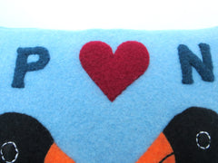 close up of personalisation on penguin cushion by cdbdi