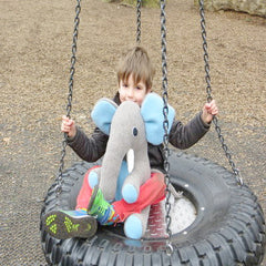 Boy on swing with large elephant, cdbdi