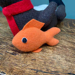 Goldfish with Large Soft Toy Otter by cdbdi