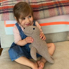 Wool Seal Soft Toy with small girl