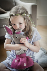 girl hugging pink bunny rabbit by cdbdi