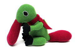 duck billed platypus soft toy in green and red