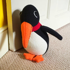 front view of personalised penguin doorstop by cdbdi
