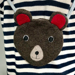 CDBDI Children's bear hand bag on a stripy jumper.