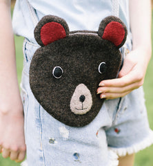 Girl's bear handbag by cdbdi worn by small girl.
