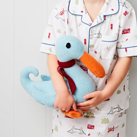 Duck in blue being held by child by cdbdi