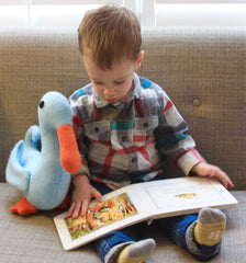 small boy with blue duck