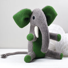 medium sized elephant with green ears by cdbdi