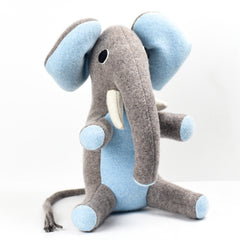 medium sized elephant with blue ears by cdbdi white background