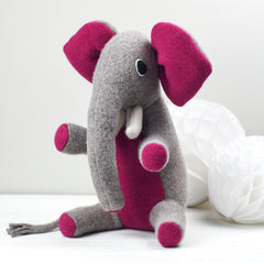 medium sized elephant with pink ears by cdbdi