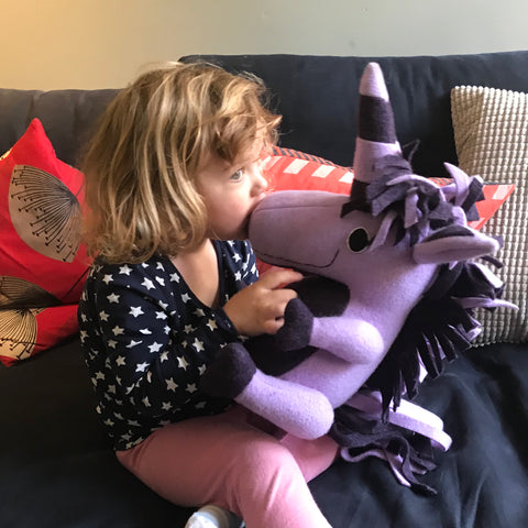small girl with purple unicorn by cdbdi